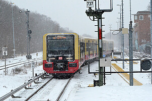 New S-Bahn in driving snow at Hermannstraße station