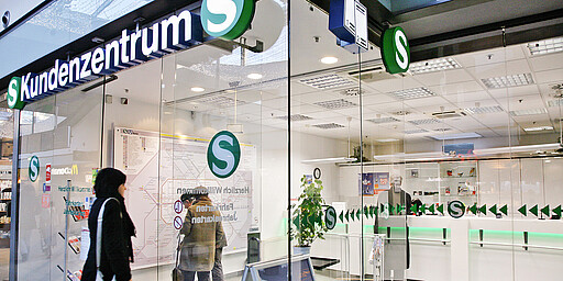 Woman enter in a poinst of sale and ticket vending