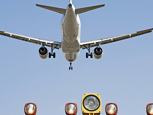 A plane in landing flight photographed from below