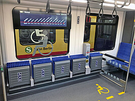 New multi-purpose compartment with folding seats, interior display, hand straps and support for wheelchair users