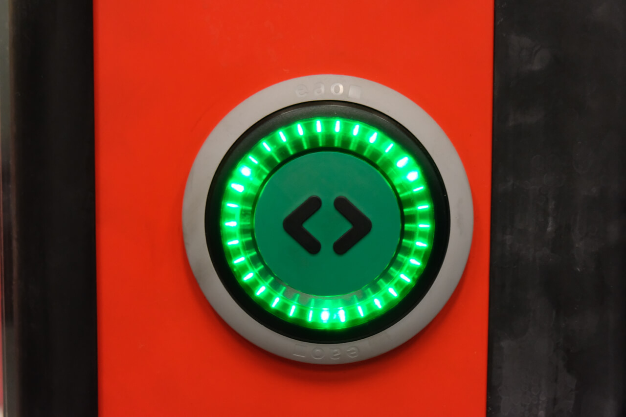 Tactile door opening buttons